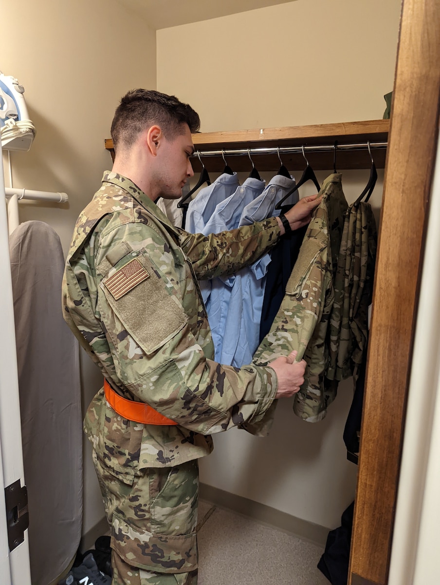 OTS Trainee performing a closet inspection