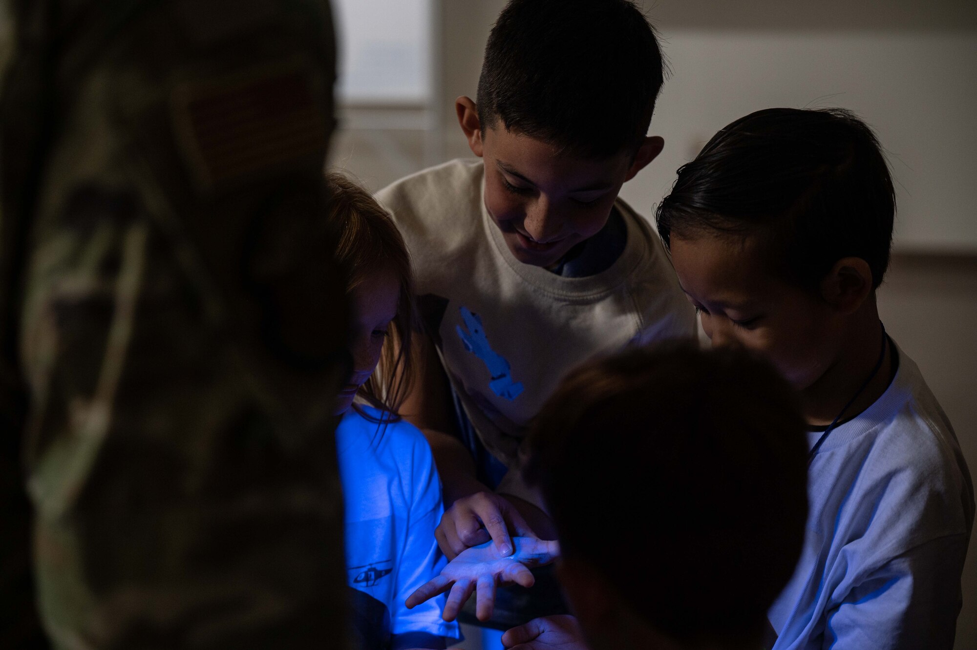 A photo of children going through a medical briefing