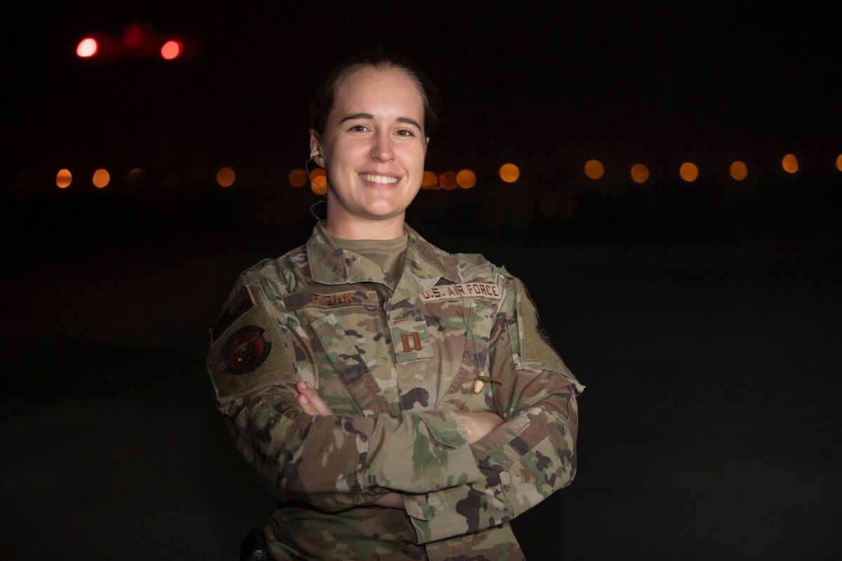 U.S. Air Force Capt. Gemma Fiduk, 386th Expeditionary Civil Engineer Squadron operations flight commander, poses for a photo after a Rapid Airfield Damage Recovery exercise at Ali Al Salem Air Base, Kuwait, October 12, 2022. “The goal of this exercise is to make sure that all of our Airmen are prepared for the possibility that they might be called upon to go out there and get in a piece of equipment they haven’t used very often.” (U.S. Air Force photo by Staff Sgt. Ashley N. Mikaio)