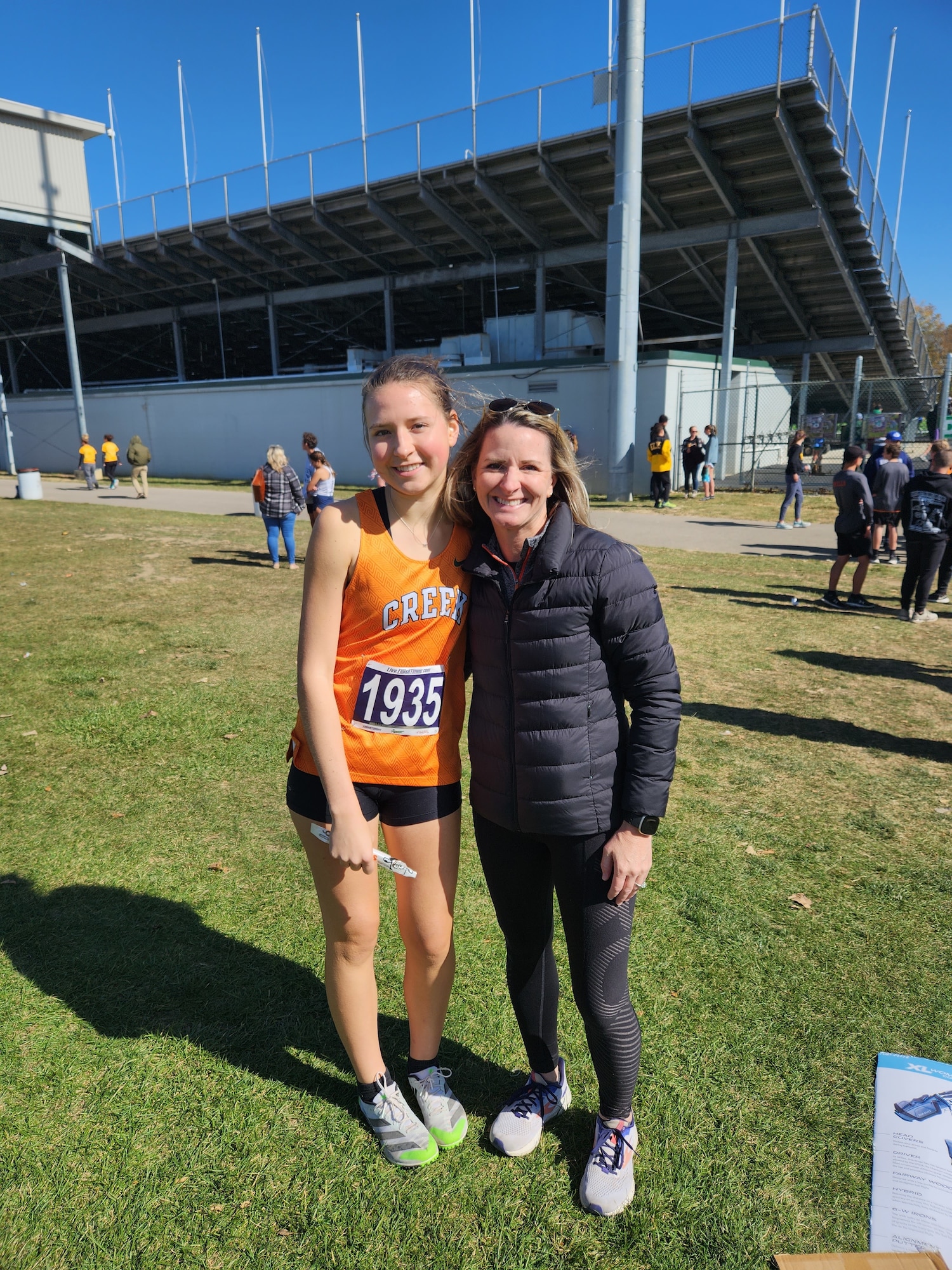 Col. Polly Sandness, with daughter Maren, after a cross country sporting event. (Courtesy photo)