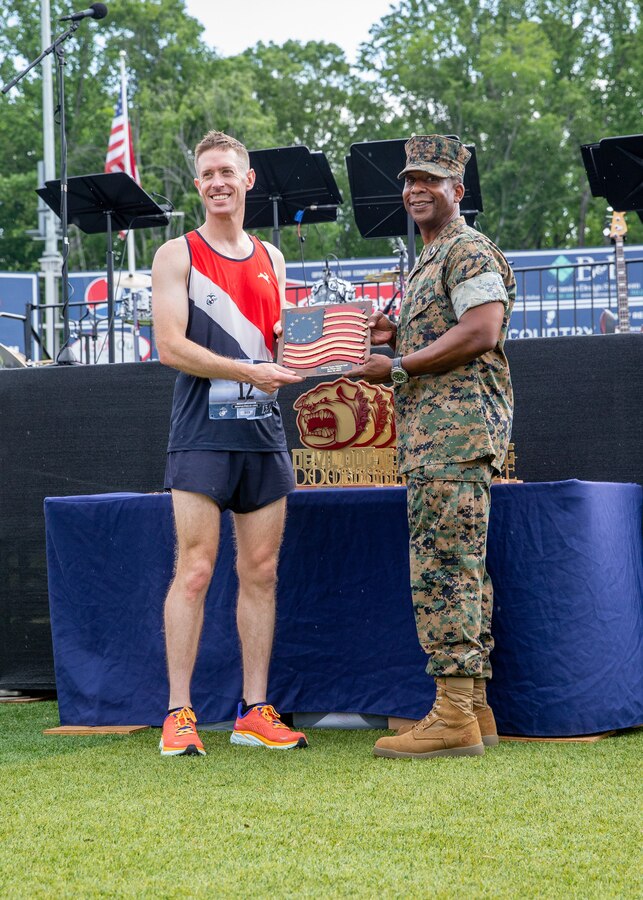 Kyle King, a native of Alexandria, Virginia, wins Marine Corps Marathon Historic Half with a time of one hour, 13 minutes and 24 seconds at the Fredericksburg Expo and Conference Center, Fredericksburg, Virginia, May 22, 2022. The Historic Half is a 13.1 mile race drew roughly 4,000 participants to promote physical fitness, generate goodwill in the community, and showcase the organizational skills of the Marine Corps. The event also included the Semper Five, 5 miles, and the Devil Dog Double, 18.1 miles. (US Marine Corps photo by Lance Cpl. Kayla LaMar)