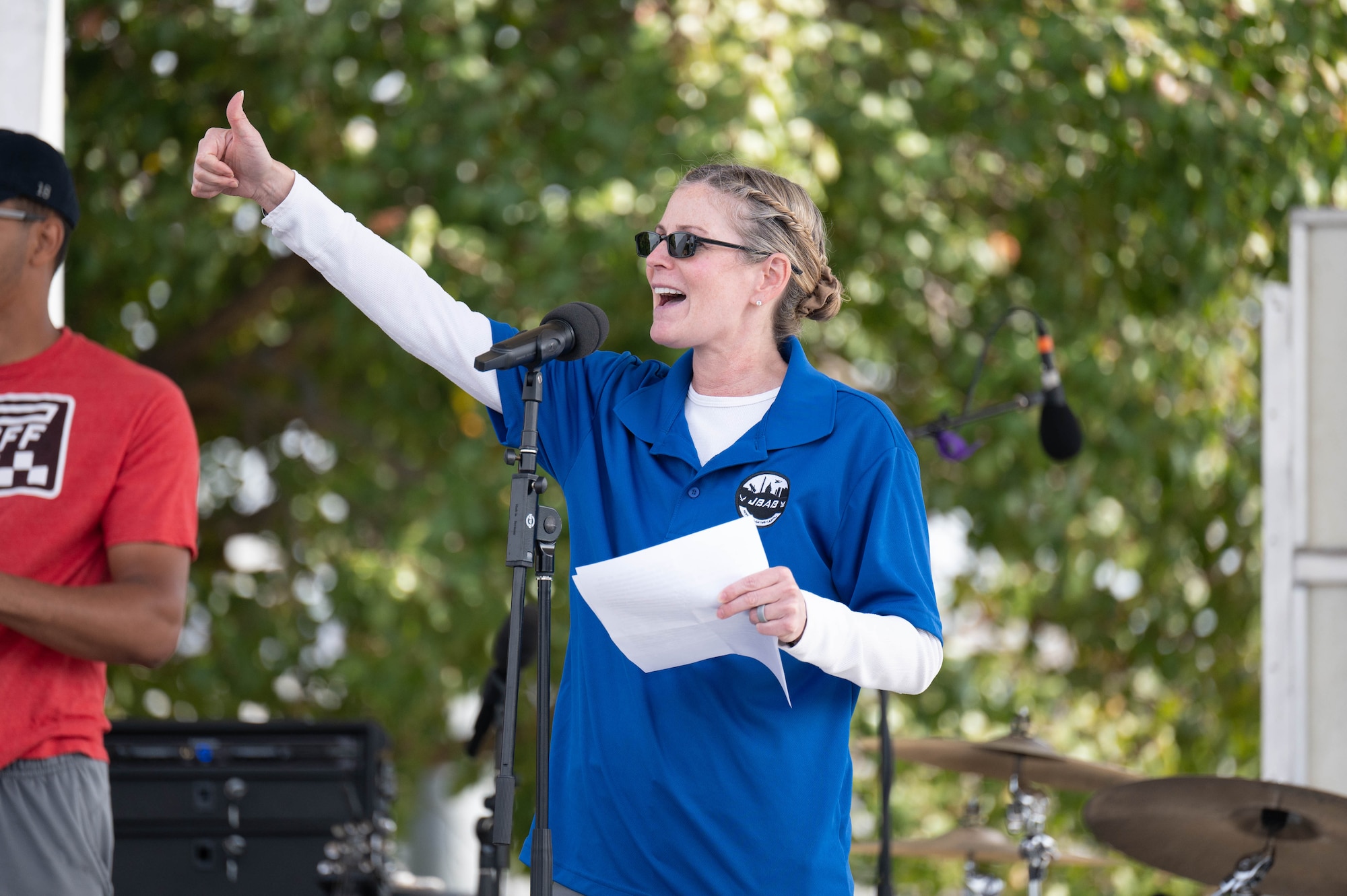 U.S. Air Force Col. Catherine "Cat" Logan, commander of Joint Base Anacostia-Bolling and the 11th Wing, provides the opening remarks at the Sentinels Celebration, Joint Base Anacostia-Bolling, Washington, D.C., Oct. 12, 2022. The Sentinels Celebration was held in honor of the base reaching Full Operational Capability after the first-ever Department of Defense lead service transfer in 2020. (U.S. Air Force photo by Kristen Wong)