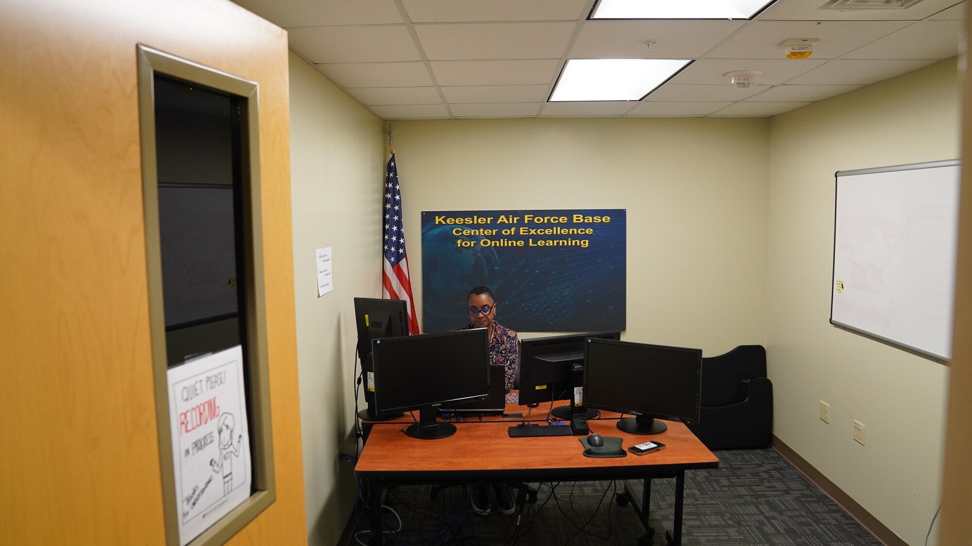 Anita Thomas, 81st Training Support Squadron online courses instructor, uses the broadcast room in Allee Hall at Keesler Air Force Base, Mississippi, Oct. 11, 2022. This room is used by instructors to facilitate learning sessions for the 81 TRSS online curriculum, including the Online Faculty Development Course.