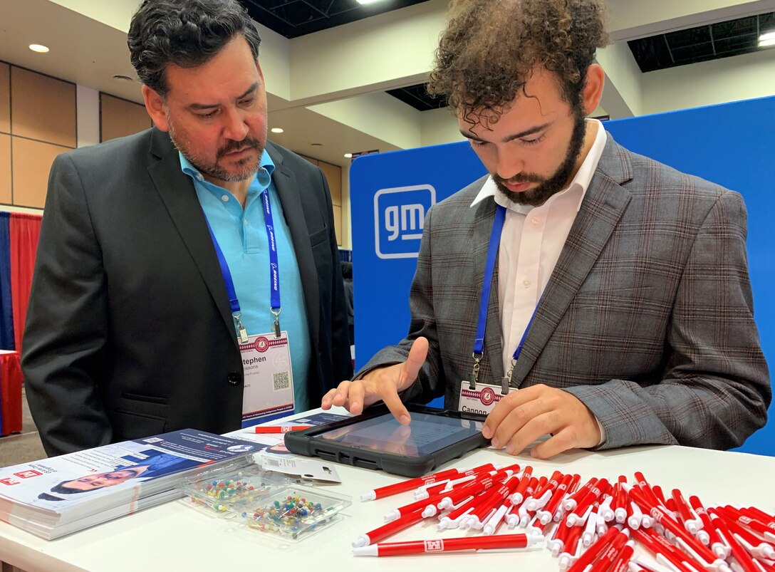 Albuquerque District Hydrology and Hydraulic Branch Chief Stephen Scissions assists Cline Cannon with registration during the American Indian Science and Engineering Society National Conference Oct. 7 at the Palm Springs Convention Center in California. Cannon, an earth and science major at Cornell, came to the U.S. Army Corps of Engineers booth to discuss career opportunities in coastal management.