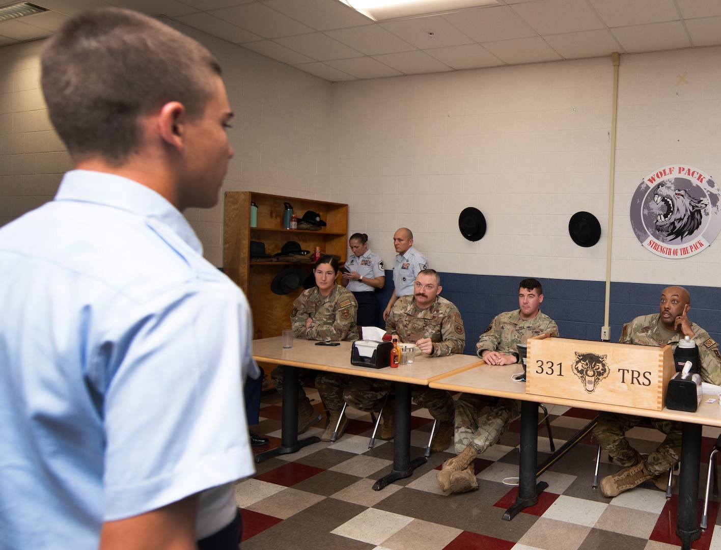 Flights must request permission from the "Snake Pit" so there is control of how many flights enter and exit the dining facility ensuring the area does not become overwhelmed with too many people at one time.