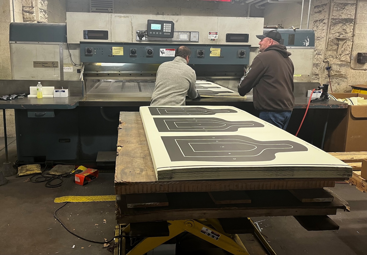 DLA employees printing targets in print facility at Rock Island Arsenal, Ill.