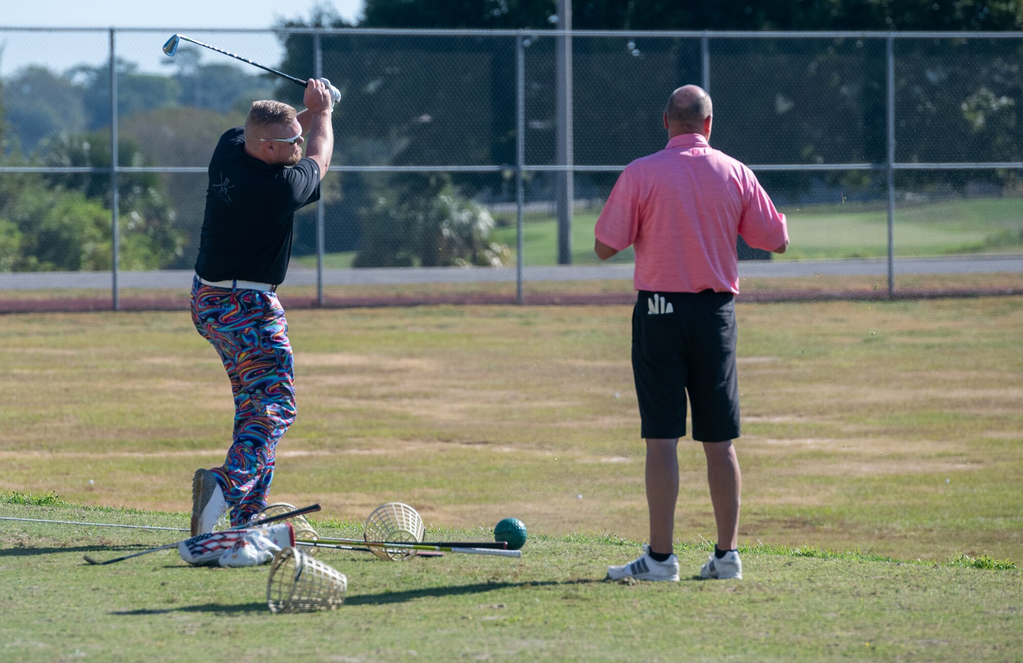 Trevor Consavage, professional golfer and trick shot entertainer, prepares for the Long Drive/Trick Shot Demonstration during the Bay Breeze Golf Course reopening ceremony at the Bay Breeze Event Center on Keesler Air Force Base, Mississippi, Oct. 14, 2022. The Ribbon Cutting Ceremony was followed by a four player scramble, prizes for teams, food and drinks. (U.S. Air Force Photo by Andre' Askew)
