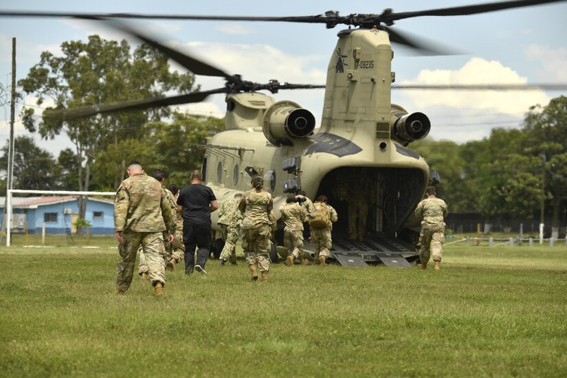 U.S. Army soldiers simulate a medical evacuation during an exercise following the Medical Effects of Ionizing Radiation course at Soto Cano Air Base, Honduras on 14 Oct 2022.