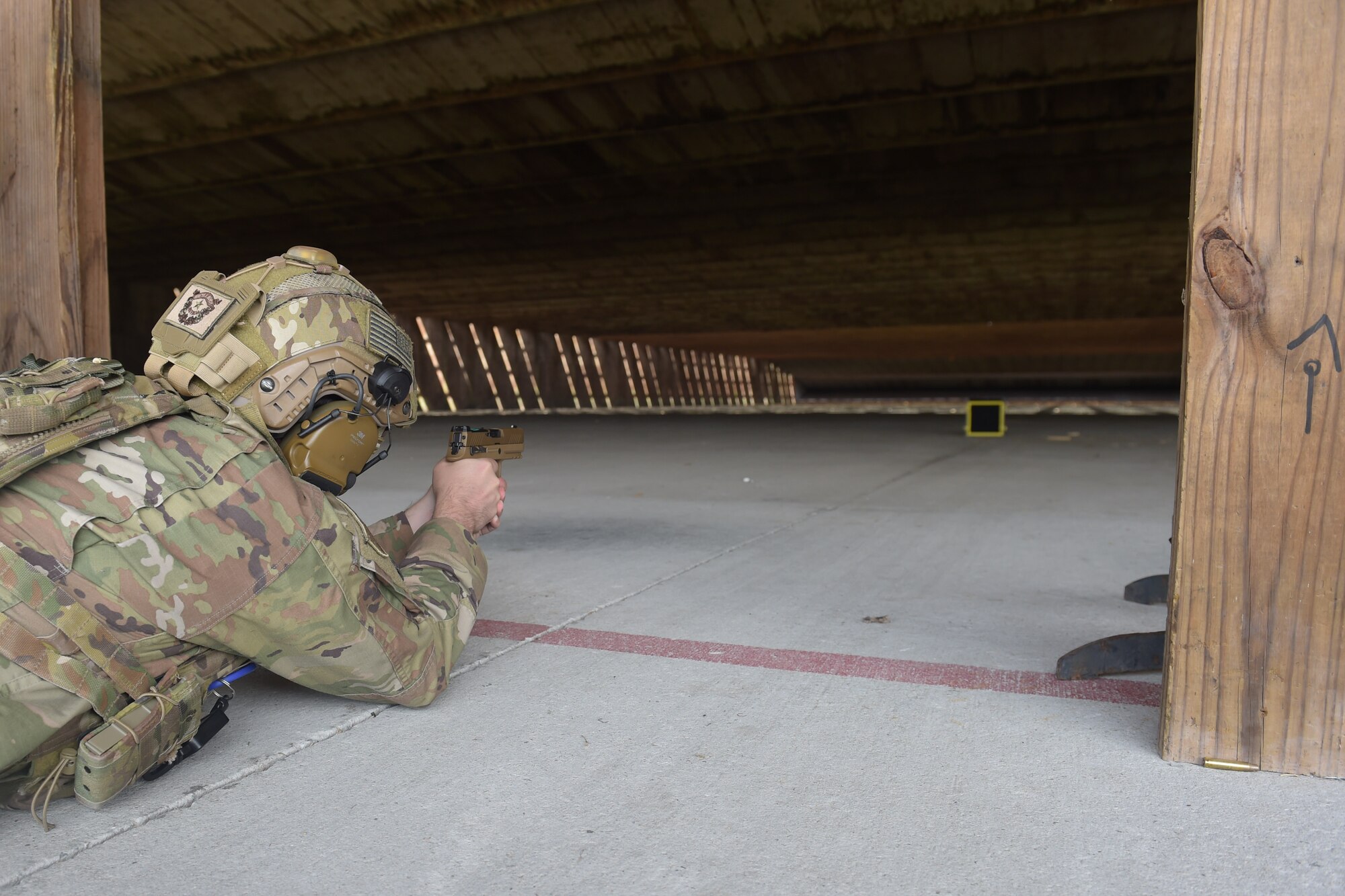 man shooting a target