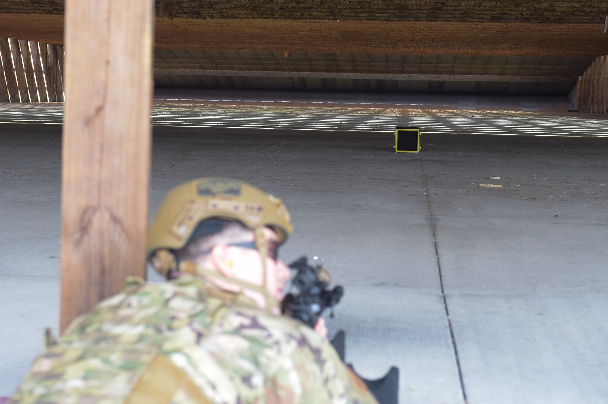 man shooting a target