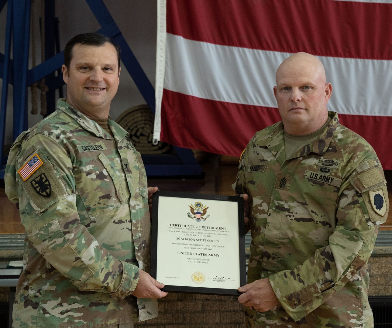 Sgt. Maj. Jason S. Coffey, of Galion, Ohio, Chief Operations noncommissioned officer, 244th Digital Liaison Detachment, based in Chicago, is presented a certificate of retirement by Col. Max Casteleyn, commander, 244th DLD, during a retirement ceremony Oct. 15 at the Northwest Armory in Chicago.