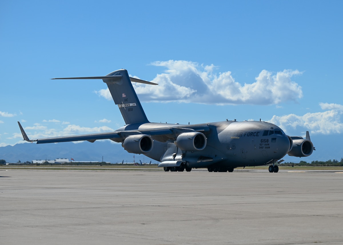 A photo of a plane on the flight line.