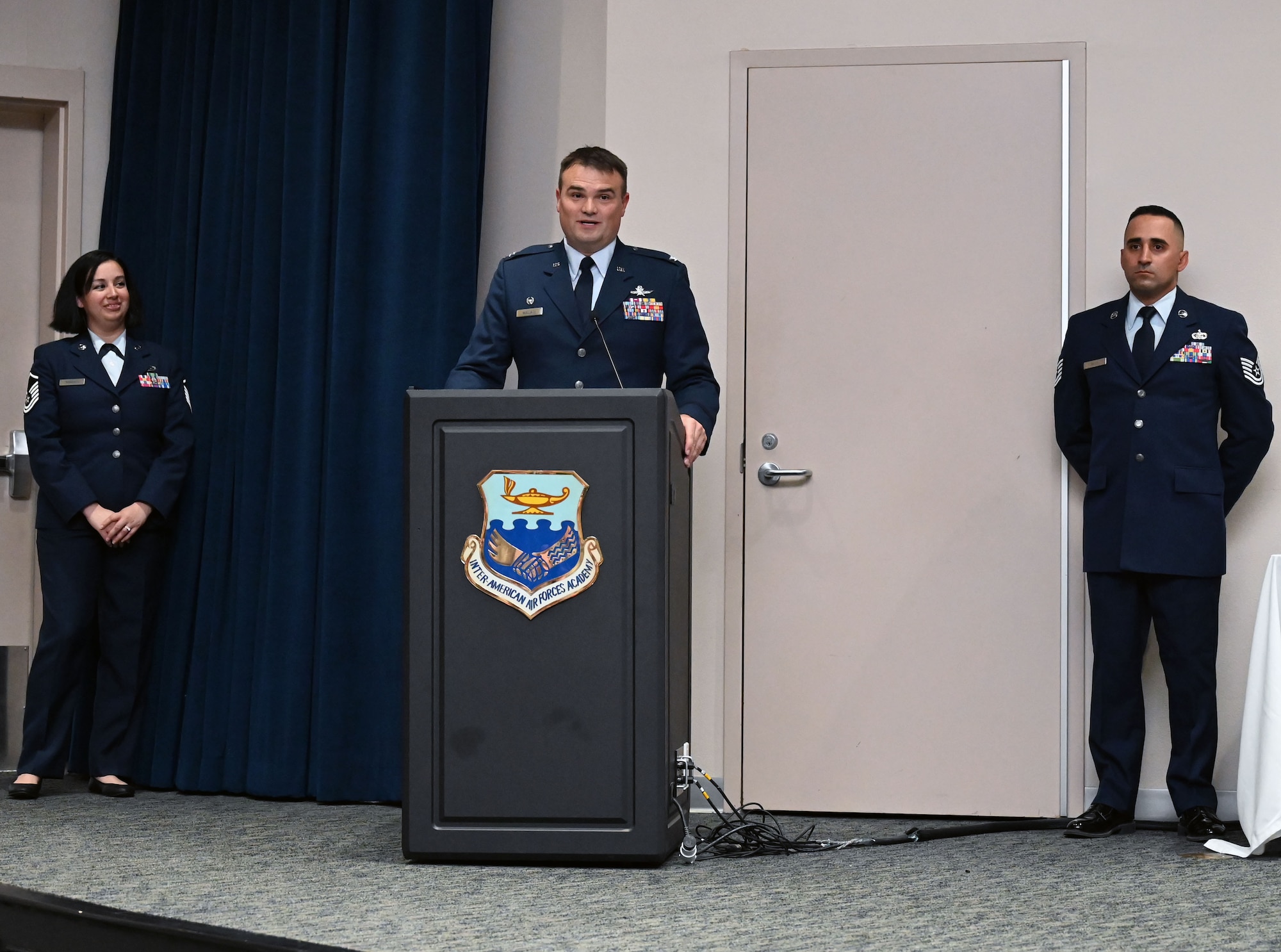 Col. Richard Wallace, 960th Cyberspace Operations Group commander, delivers a speech during the 960th COG change of command ceremony Oct. 15, 2022, at Joint Base San Antonio-Lackland, Texas. (U.S. Air Force photo by Staff Sgt. Monet Villacorte)