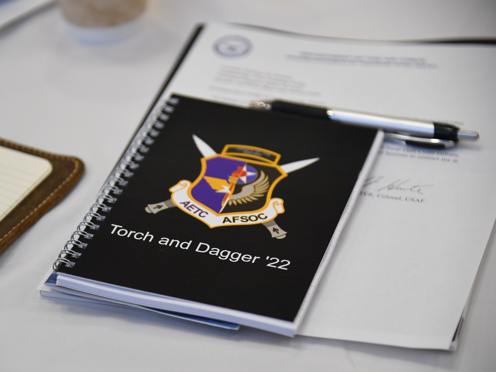 A booklet is on display during the inaugural Torch and Dagger professional development seminar at Keesler Air Force Base, Mississippi, October 13, 2022.