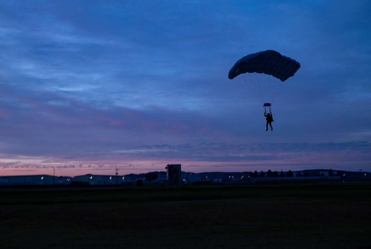 An operator participating in joint training between U.S. and Republic of Korea (ROK) special operations forces (SOF), parachutes into a pre-designated drop zone