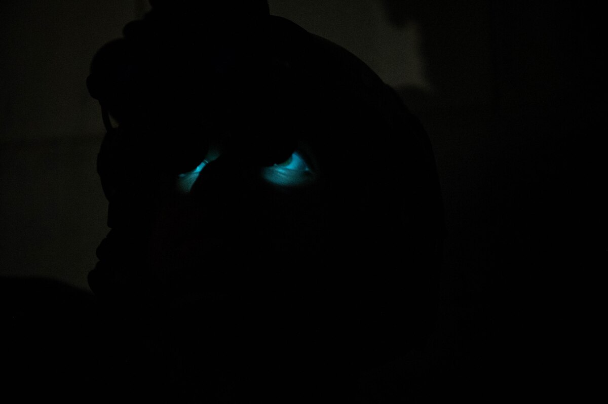 An operator participating in joint training between U.S. and Republic of Korea (ROK) special operations forces, looks through night vision goggles