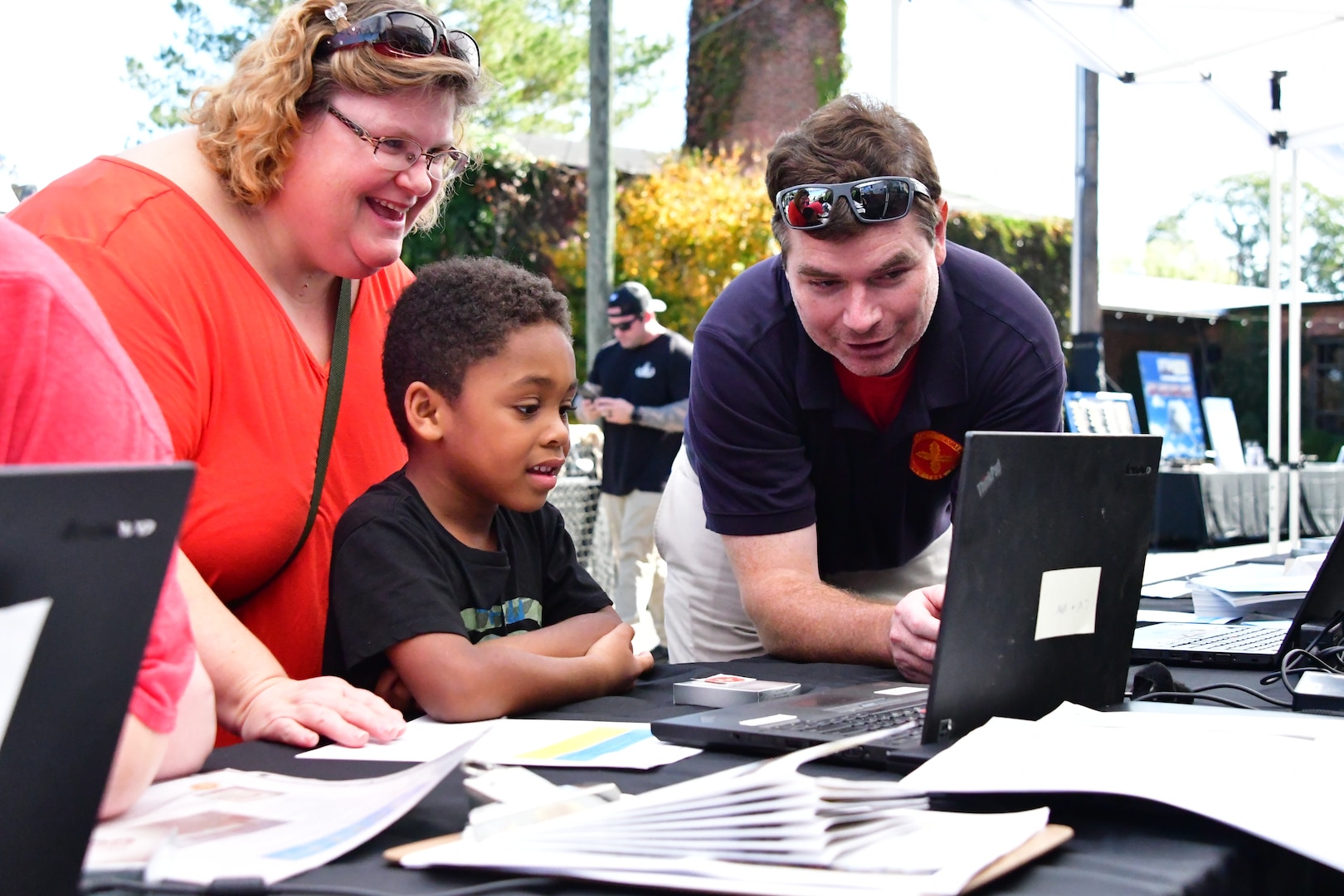 IMAGE: Community members enjoy a few of the STEM displays at Dahlgren Downtown, Oct. 14. Naval Surface Warfare Center Dahlgren Division hosted the inaugural Dahlgren Downtown event at The Inn at Old Silk Mill in downtown Fredericksburg. In addition to the science, technology, engineering and math displays community members were able to view a number of Dahlgren historical artifacts.