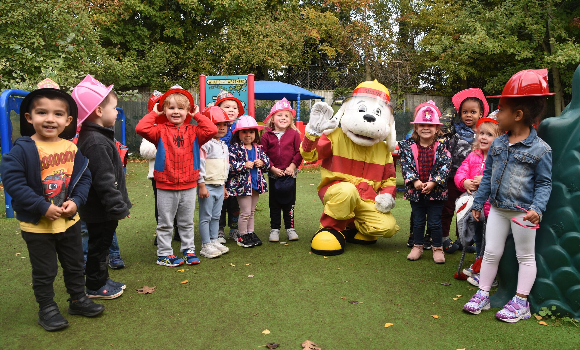 Sparky the Fire Dog and some of his firefighter friends from the 100th Civil Engineer Squadron Fire Department visited pre-schoolers at the child development center as part of Fire Prevention Week at Royal Air Force Mildenhall, England, Oct. 12, 2022. This year’s FPW theme is “Fire won’t wait: Plan your escape.” Other activities included information booths, open house at the fire department, bowling and a fire muster. (U.S. Air Force photo by Karen Abeyasekere)