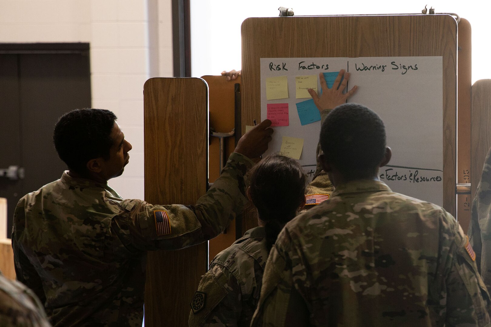 Soldiers from the Illinois Army National Guard’s 1244th Transportation Company participate in breakout sessions discussing the risk factors and warning signs of suicide during Suicide Prevention training at the North Riverside Armory in Broadville, Illinois, on September 10, 2022.