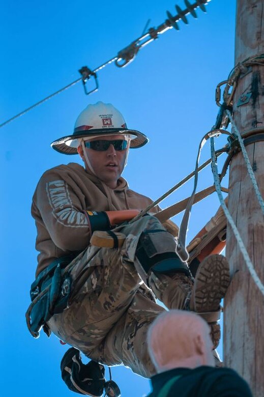 Lineman industry professional participate in the 38th International Lineman’s Rodeo at the National Agricultural Center and Hall of Fame in Bonner Springs, Kansas, on Oct. 15, 2022. The rodeo is a chance for industry professionals to come and compete in four different events to practice their skills alongside each other, either as a journeyman team or as an apprentice. | Photo by Reagan Zimmerman, Kansas City District Public Affairs