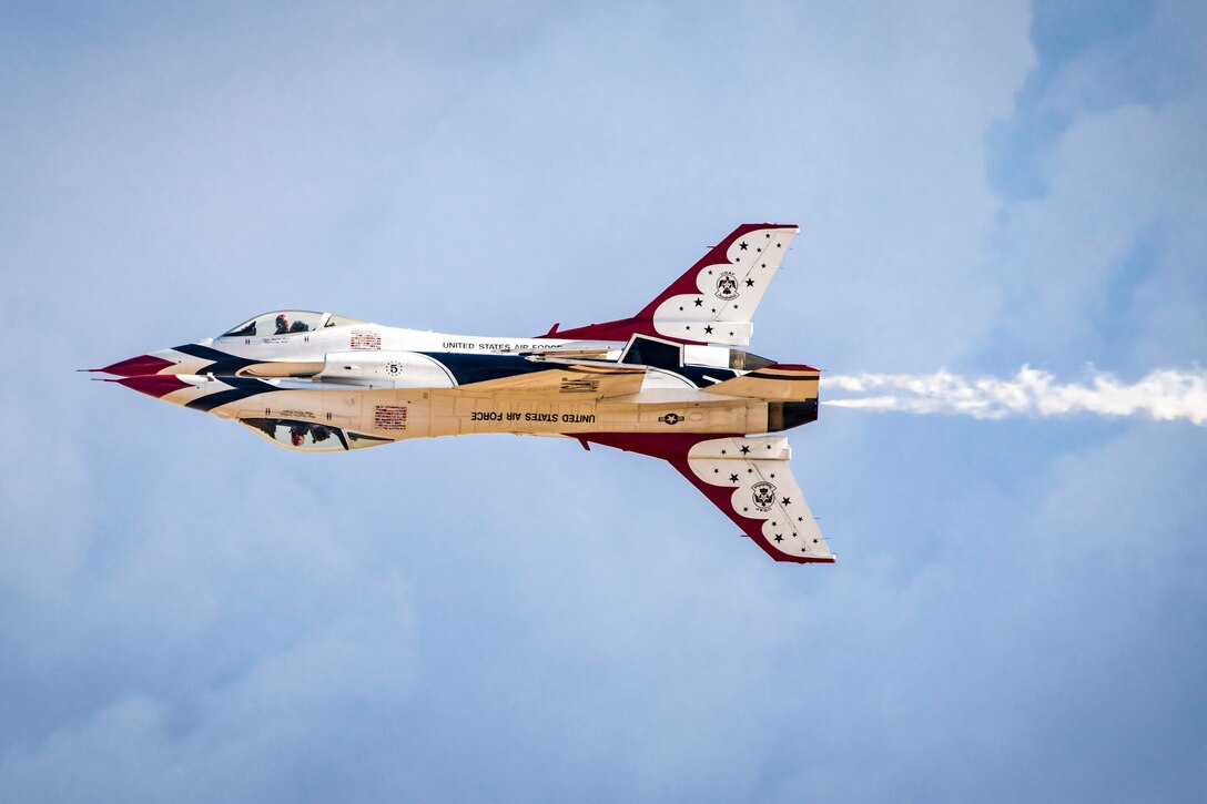 Two aircraft fly on top of each other.