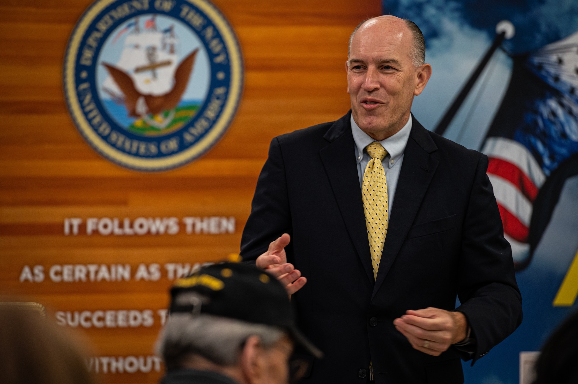Christopher Burns, Navy Exchange Service Command senior vice president, provides opening remarks during the presentation of the 2021 Bingham Award for Navy Exchange Lakehurst at Joint Base McGuire-Dix-Lakehurst, N.J., Oct. 18, 2022.
