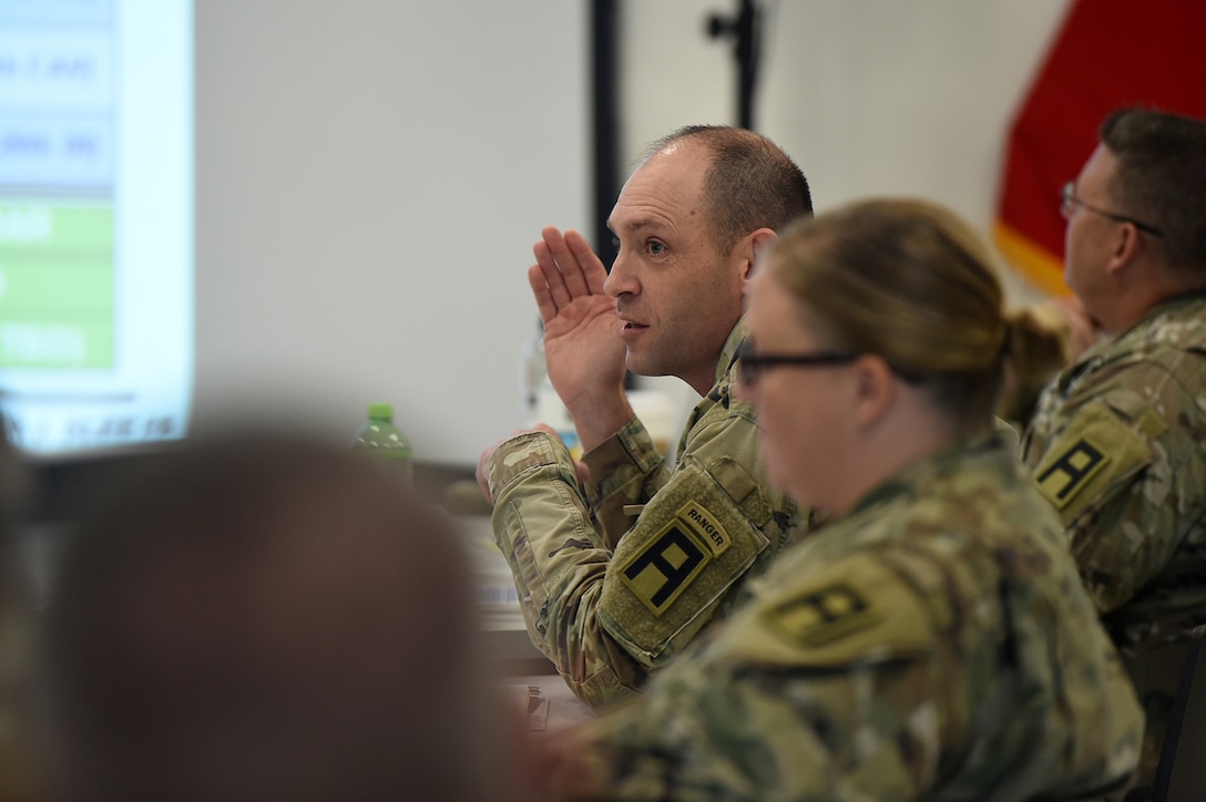 Col. James Krueger, Commander, 174th Infantry Brigade, interjects remarks during a briefing at the 85th U.S. Army Reserve Support Command’s Brigade Command Teams Training event in Arlington Heights, Illinois, October 15, 2022.