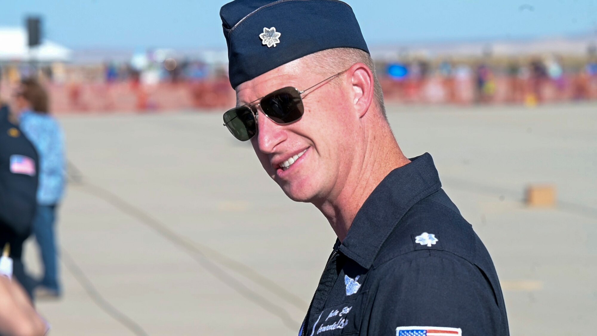 Lt. Col. Justin "Astro" Elliott, USAF Thunderbirds Commander, signs autographs during the 2022 Aerospace Valley Air Show at Edwards Air Force Base. (U.S. Air Force photo by Adam Bowles)
