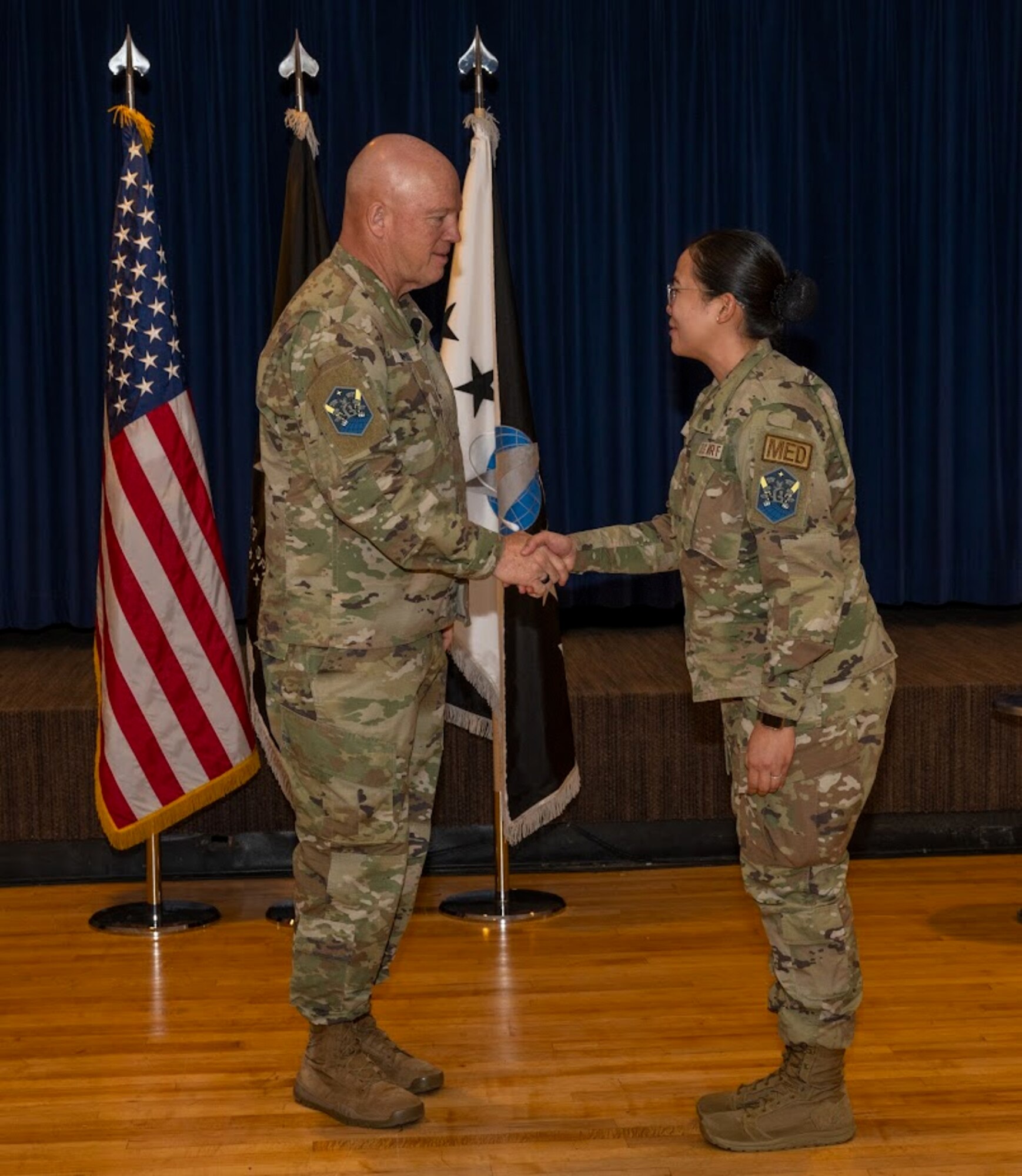 Gen Raymond coining an airman at the SBD 1 all-call