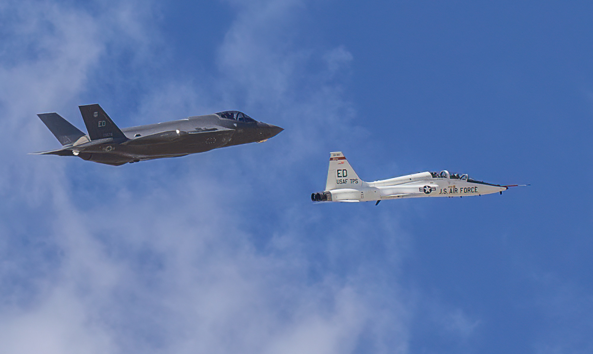 An F-35 and T-38 fly by during the STEM outreach flyover across the Antelope Valley and Tehachapi.