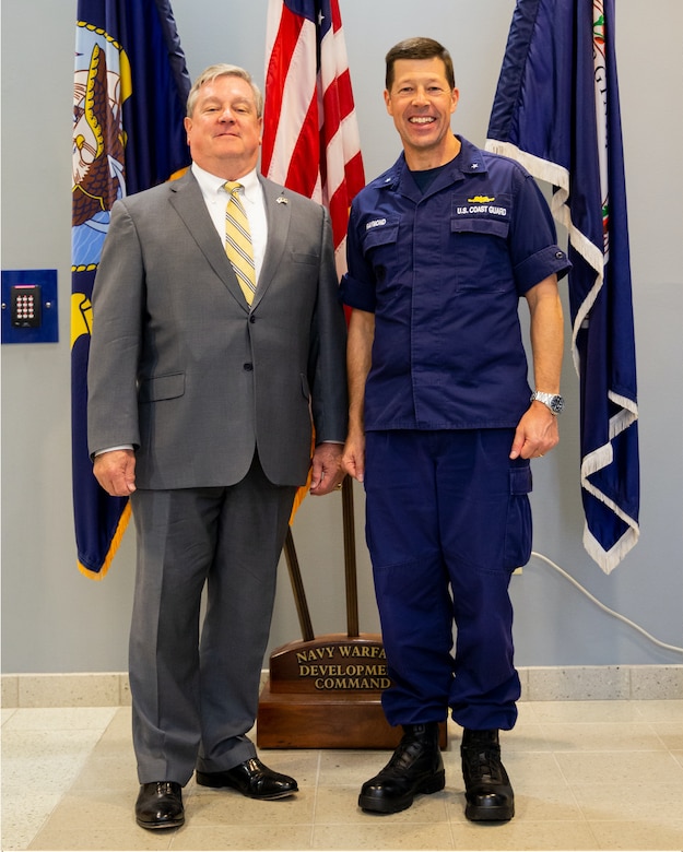 Director Durkin greeting Rear Admiral M.W. Joe Raymond