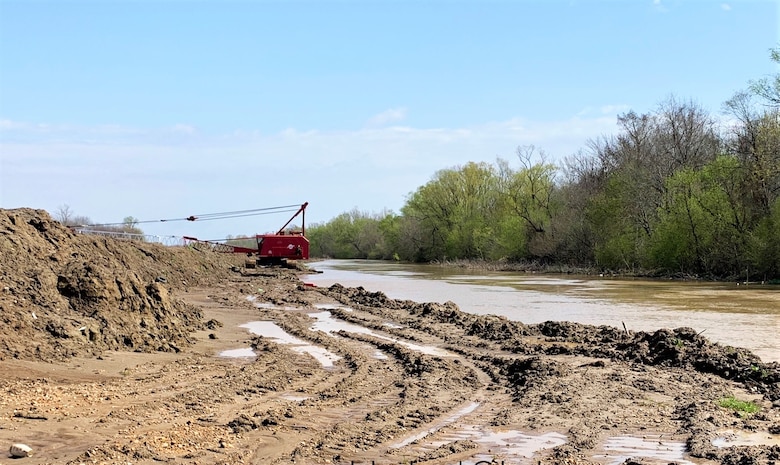 Quality Assurance photo of the Locust Creek project site in Craighead County, Arkansas. The creek is part of the St. Francis River Basin and required approximately 12,000 linear feet of sediment removal. A $1,289,305 contract was awarded to Innovative Performance Construction Company to complete the needed two miles of excavation.

"The purpose of this project was to improve drainage along the Locust Creek area," Wynn Area Office Civil Engineer Jason Britt said. "Improvements to drainage will reduce standing water upstream of the project area, thereby reducing the amount of standing water against the levees."

To clear the creek, the contractor removed material from the channel using a dragline before placing the excavated material in the levee as Excavated Material Embankment (EME). In partnership with the St. Francis Levee District of Arkansas, construction began on Oct. 15, 2021. It was declared substantially complete on Jul. 9, 2022.