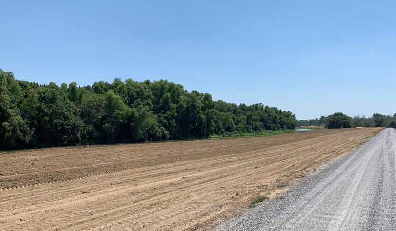 Quality Assurance photo of the Locust Creek project site in Craighead County, Arkansas. The creek is part of the St. Francis River Basin and required approximately 12,000 linear feet of sediment removal. A $1,289,305 contract was awarded to Innovative Performance Construction Company to complete the needed two miles of excavation.

"The purpose of this project was to improve drainage along the Locust Creek area," Wynn Area Office Civil Engineer Jason Britt said. "Improvements to drainage will reduce standing water upstream of the project area, thereby reducing the amount of standing water against the levees."

To clear the creek, the contractor removed material from the channel using a dragline before placing the excavated material in the levee as Excavated Material Embankment (EME). In partnership with the St. Francis Levee District of Arkansas, construction began on Oct. 15, 2021. It was declared substantially complete on Jul. 9, 2022.