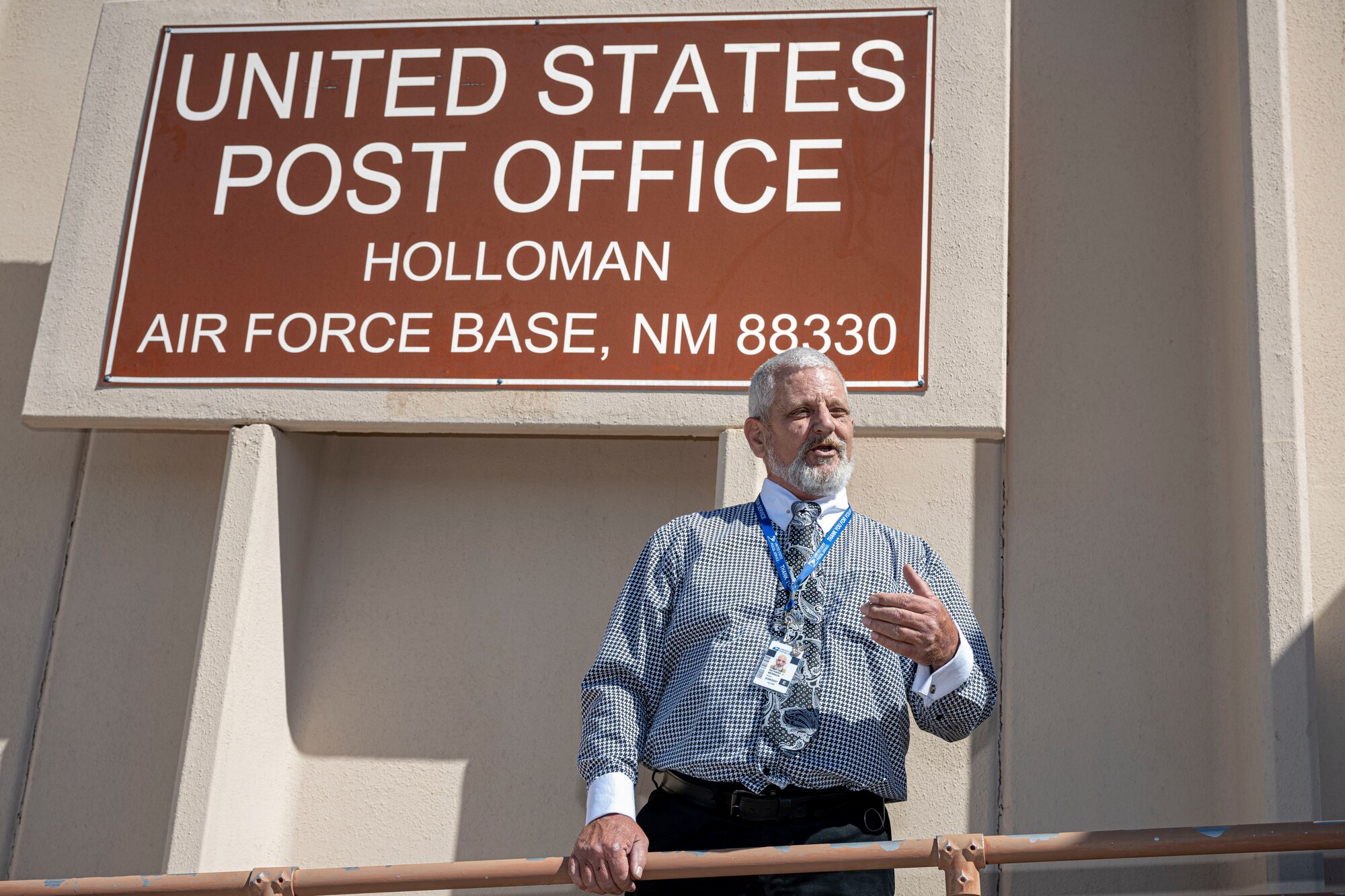 Richard Merrick, Holloman Air Force Base post office postmaster, gives remarks during a swearing-in ceremony at Holloman Air Force Base, New Mexico, Oct. 19, 2022. Merrick’s responsibilities include oversight of all post office operations, tracking on-base mail delivery, managing the schedules and pay for five employees, and passport services. (U.S. Air Force photo by Airman 1st Class Antonio Salfran)