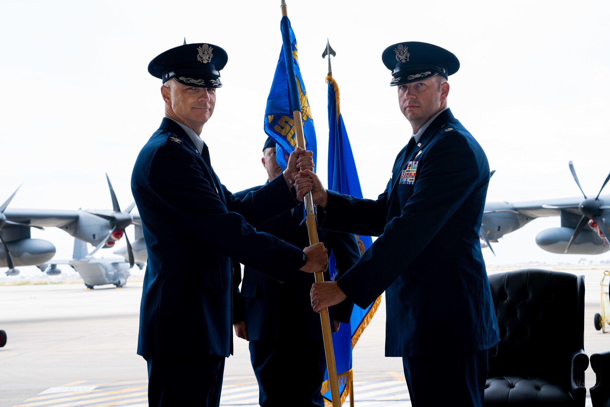 Lt. Col. Michael Roy, 6th Special Operations Squadron commander, receives the squadron guidon from Col. Michael Shreves, 27th Special Operations Group commander, during the 6 SOS activation at Cannon Air Force Base, N.M., Oct. 6, 2022. Previously the 27 SOG Detachment 1, the 6 SOS is an MC-130J Commando II aircraft flying unit that fulfills the 27th Special Operations Wing’s commitment to the Air Force Special Operations Command’s new deployment model. (U.S. Air Force photo by Airman 1st Class Cassidy Daniel)
