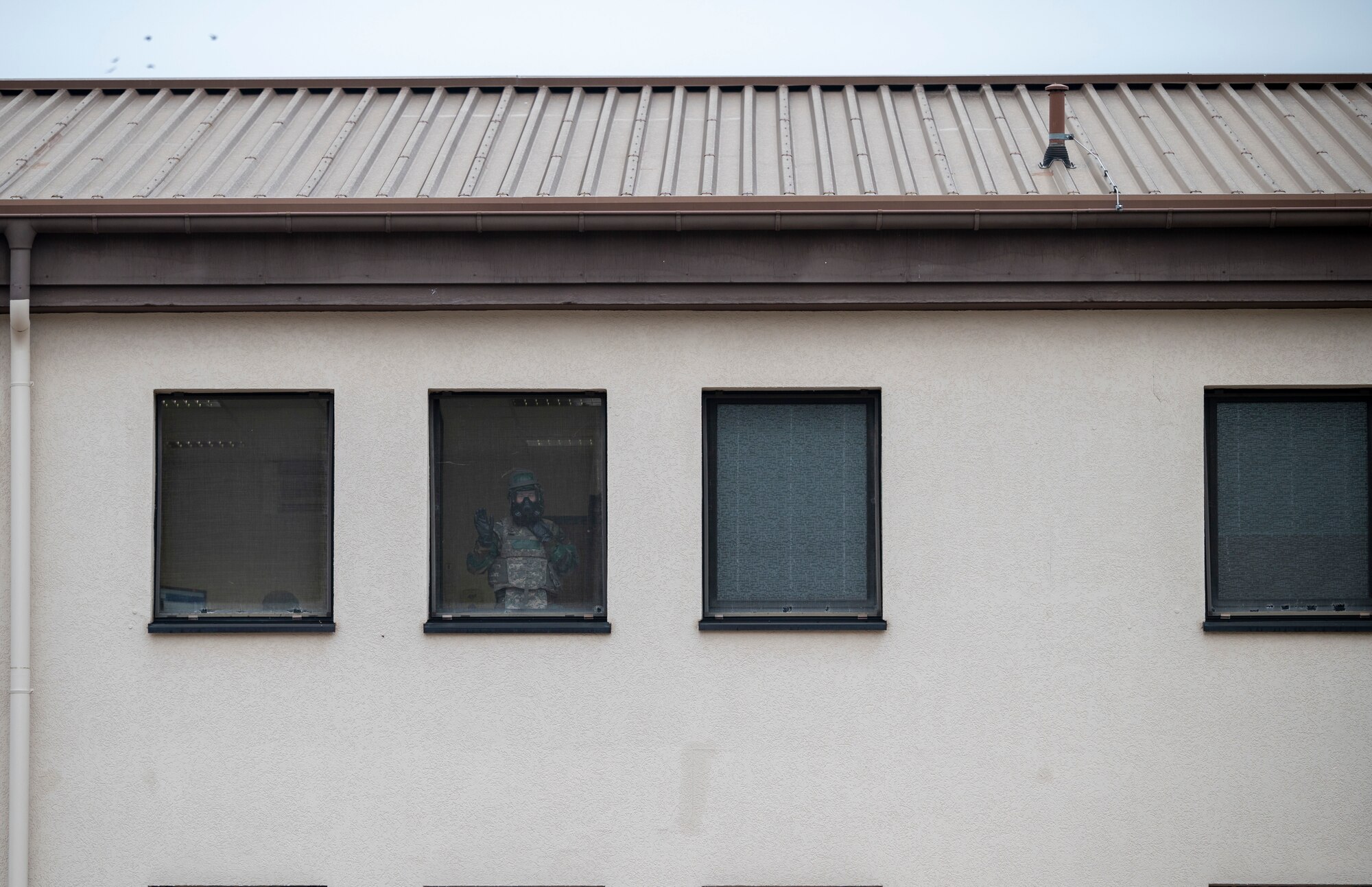 Airman looks out the window