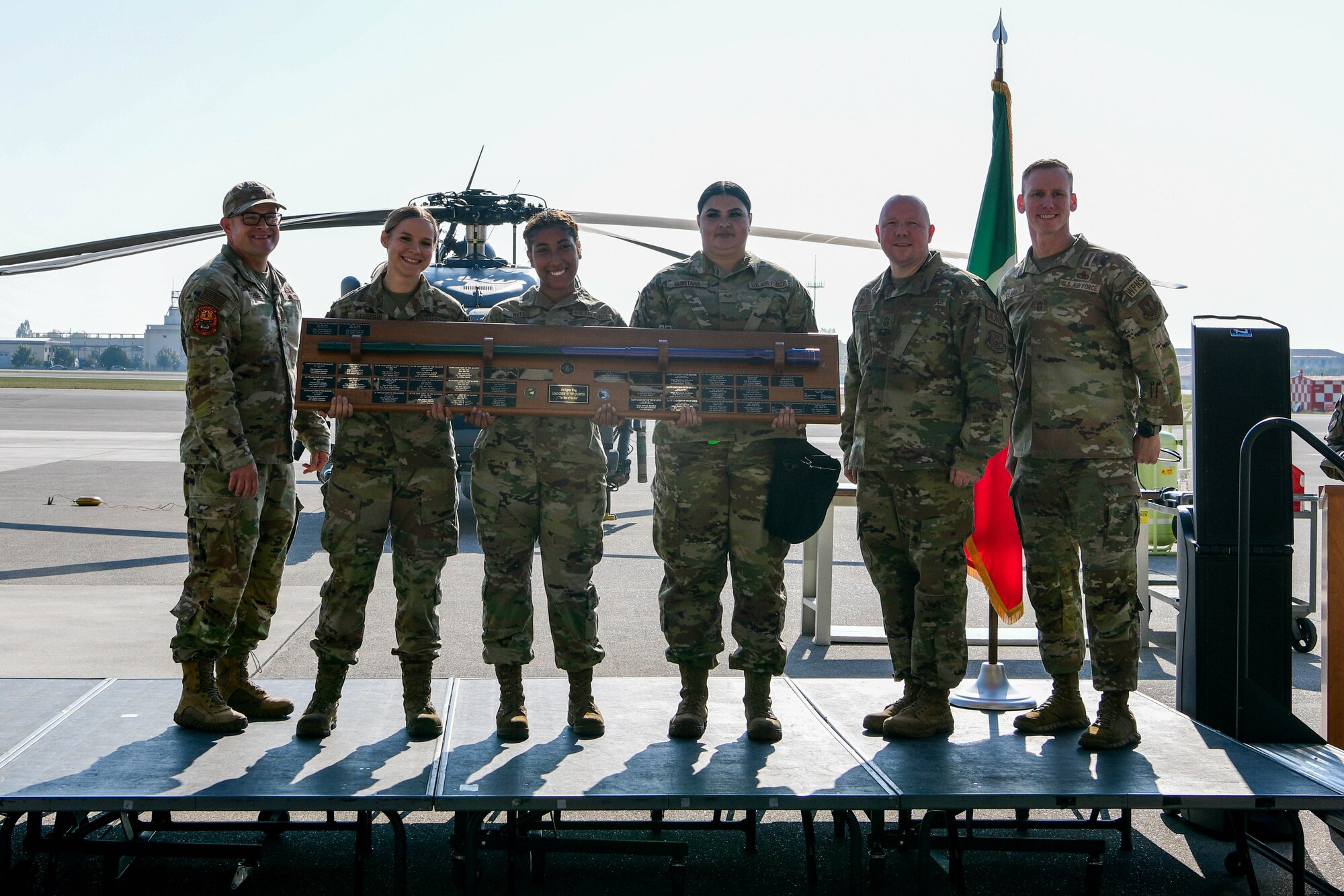 Weapons load crew members assigned to the 555th Fighter Generation Squadron pose for a photo at Aviano Air Base, Italy, Oct. 14, 2022. The team won first place in the 3rd quarter Rapid Employment (RAGE) event by loading an F-16 Fighting Falcon with an inert guided bomb unit-31v3 Joint Direct Attack Munition (JDAM), a MK-84 Low Drag and one AIM-9L/M Sidewinder in the shortest amount of time. (U.S. Air Force photo by Senior Airman Brooke Moeder)