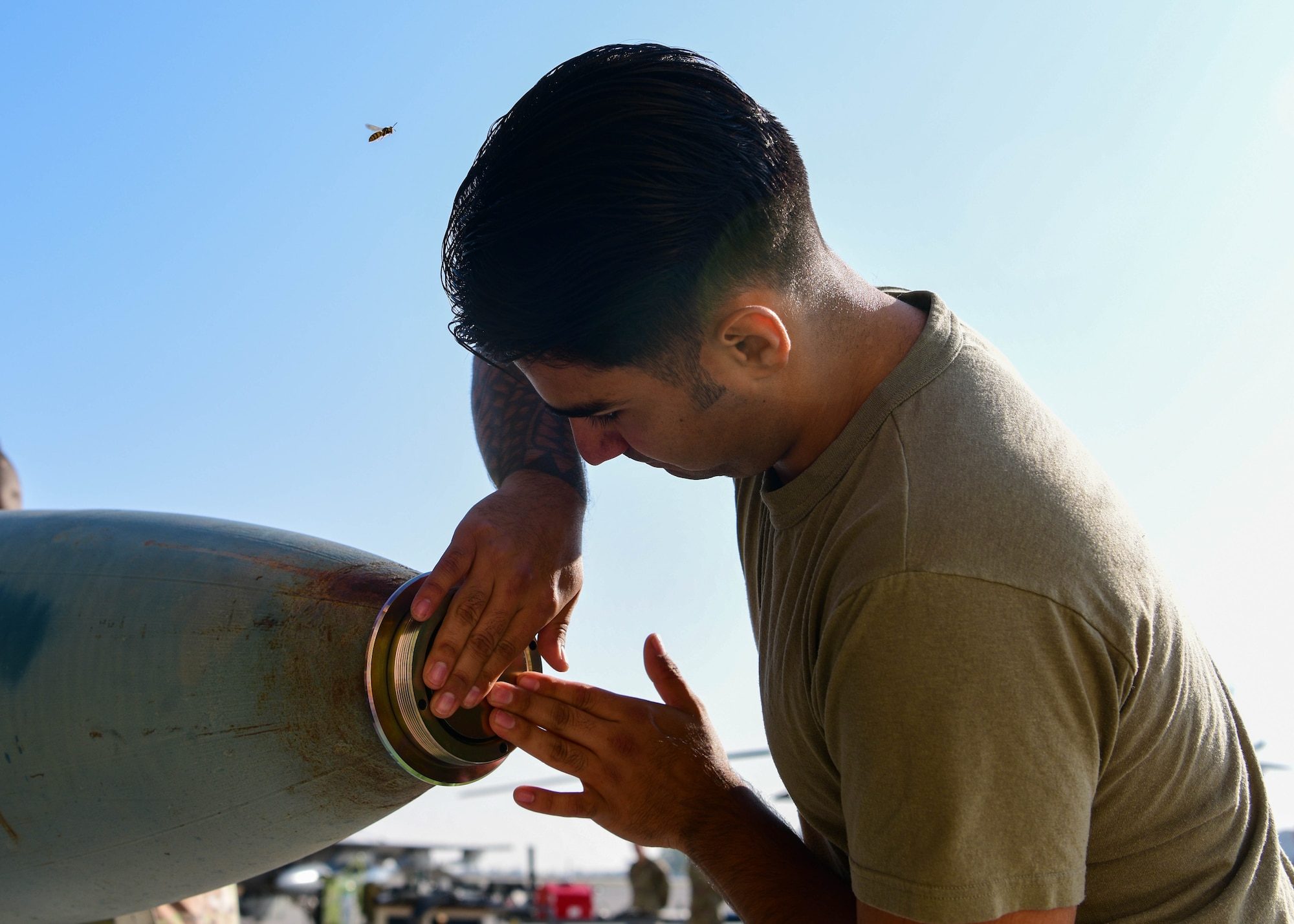 Tech. Sgt. Josiah Lucio, 31st Munitions Squadron stockpile management production supervisor, assembles an inert munition during the 3rd quarter Rapid Aircraft Generation and Employment (RAGE) event at Aviano Air Base, Italy, Oct. 14, 2022. During RAGE, instructors evaluated the teams on technical proficiency, safety procedures and overall completion time. (U.S. Air Force photo by Senior Airman Brooke Moeder)