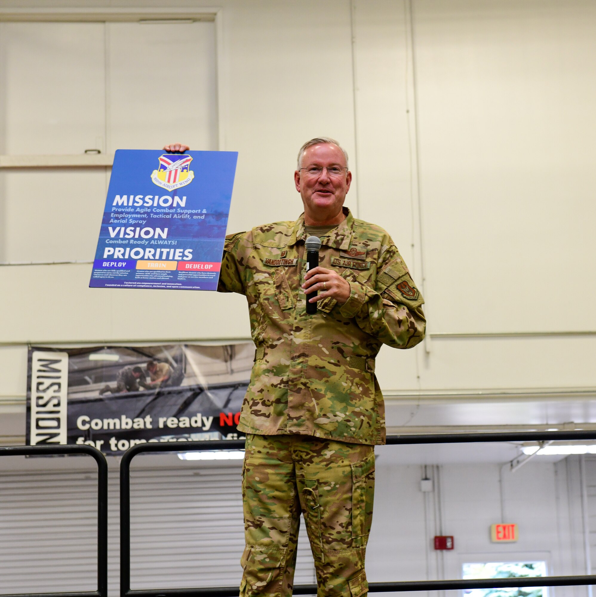 Col. Jeff Van Dootingh, commander of the 910th Airlift Wing, introduces the wing’s mission, vision and priorities to the Airmen of the 910th AW during a base commander’s call here, Oct. 15, 2022.
