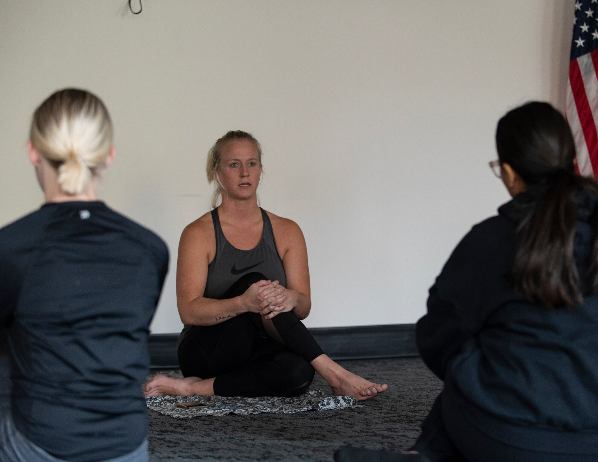 U.S. Air Force Master Sgt. (ret.) Ashley Wilkins teaches a yoga class in St. Paul., Oct. 16, 2022.