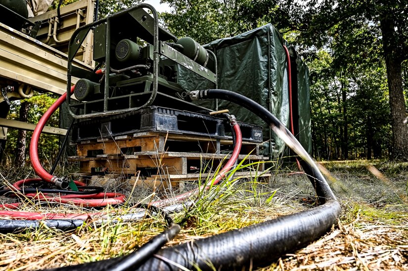 A water filtration system assigned to the U.S. Army 58th Troop Command was set up at Joint Base McGuire-Dix-Lakehurst, N.J. on Oct. 17, 2022. Shower, Laundry, and Clothing Repair Specialists are primarily responsible for supervising and performing laundry, shower, personnel and clothing decontamination functions. These capabilities are essential to the health and welfare of soldiers in training or deployed environments. Good hygiene is required by all who are subject to the laws and regulations defined by the UCMJ in order to prevent the spread of disease that may compromise mission success.