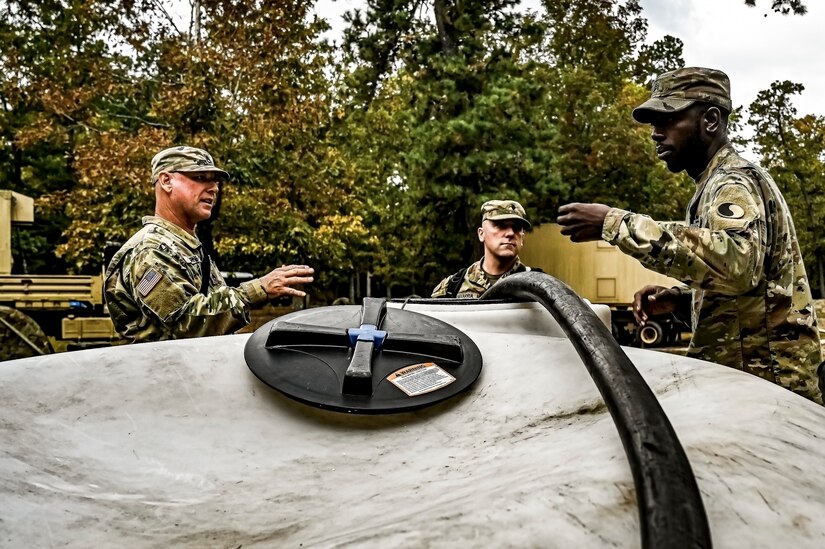 U.S. Army Soldiers assigned to the U.S. Army 58th Troop Command set up a water filtration unit at Joint Base McGuire-Dix-Lakehurst, N.J. on Oct. 17, 2022. Shower, Laundry, and Clothing Repair Specialists are primarily responsible for supervising and performing laundry, shower, personnel and clothing decontamination functions. These capabilities are essential to the health and welfare of soldiers in training or deployed environments. Good hygiene is required by all who are subject to the laws and regulations defined by the UCMJ in order to prevent the spread of disease that may compromise mission success.