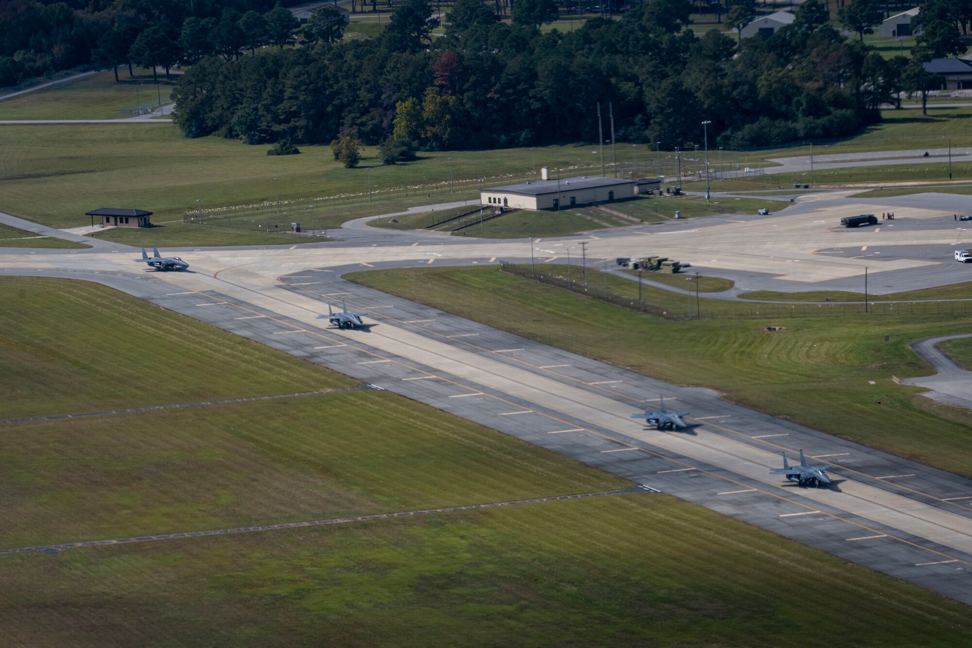 F-15E Strike Eagles assigned to the 335th Fighter Squadron taxi at Seymour Johnson Air Force Base, North Carolina, Oct. 14, 2022. The Strike Eagles provided air-to-air and air-to-ground defenses for the Air Force Central Command area of responsibility.