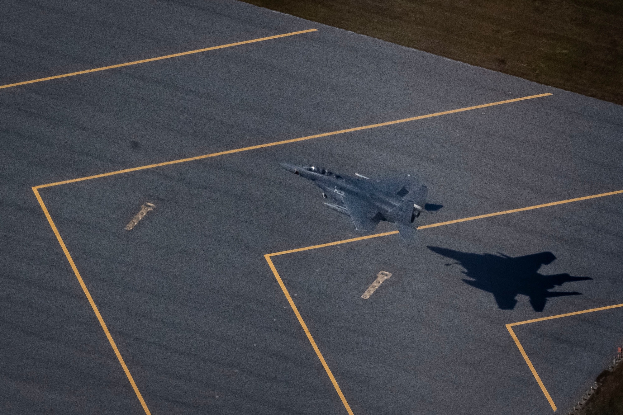 An F-15E Strike Eagle assigned to the 335th Fighter Squadron lands at Seymour Johnson Air Force Base, North Carolina, Oct. 14, 2022. The 335th FS and 335th Fighter Generation Squadron deployed to provide a defensive posture to military personnel stationed in Air Force Central Command.