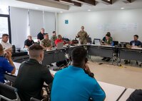 U.S. Army Lt. Col. Tiffianey Laurin, the Joint Task Force Civil Support Incident Support Team 4 officer-in-charge, gives a reception brief to exercise participants during their arrival in Reynosa, Mexico as part of exercise Fuerzas Amigas 2022, at Campo Militar Reynosa, Oct. 16. FA22 is a binational disaster-response exercise between the U.S. and Mexican militaries Oct. 17-21, along the U.S.-Mexican border. The purpose of this annual exercise is to improve readiness and strengthen the two nations’ cooperative relationship. U.S. Army North, through Joint Task Force Civil Support will serve as the command-and-control element directing U.S. troops conducting a natural disaster response exercise alongside Mexican military forces. (U.S. Navy photo by Mass Communication Specialist 1st Class Michael H. Lehman)