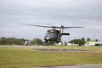 An HH-60M Blackhawk helicopter attached to the 2nd General Support Aviation Battalion, 3rd Combat Aviation Brigade, 3rd Infantry Division, from Hunter Army Airfield, Ga., lifts off carrying a simulated medical casualty during exercise Fuerzas Amigas 2022 at Campo Militar Reynosa, Mexico, Oct. 18, 2022.