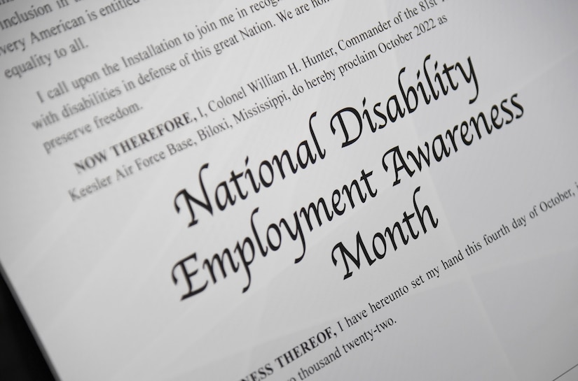A document prominently displays the words "National Disability Employment Awareness Month."