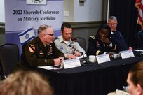 Brig. Gen. Anthony McQueen, commanding general of U.S. Army's Medical Research and Development Command (MRDC), speaks during a panel presentation at the 20th biennial Shoresh Military Medicine Conference in Rockville, Maryland, Sept. 19, 2022.