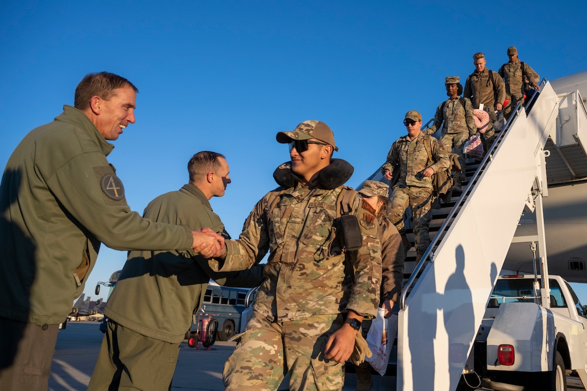 Airmen assigned to the 4th Fighter Wing return from a deployment at Seymour Johnson Air Force Base, North Carolina, Oct. 19, 2022. The 4th FW deployed to provide a defensive posture to military personnel stationed in the Air Force’s Central Command area of responsibility. (U.S. Air Force photo by Senior Airman Kevin Holloway)