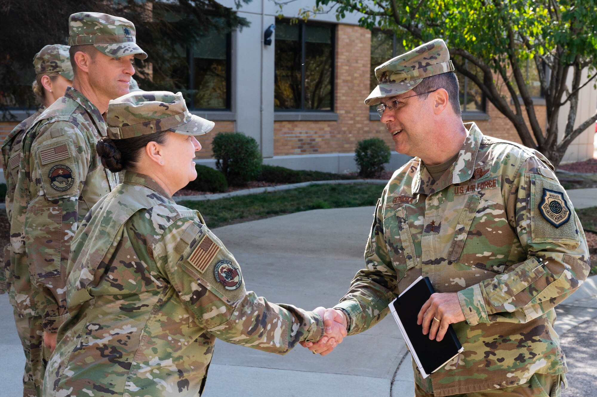 Maj. Gen. Andrew Gebara, 8th Air Force and Joint-Global Strike Operations Center commander, is greeted by members of the 28th Bomb Wing on Ellsworth Air Force Base, S.D., Oct. 17, 2022. Members of Ellsworth showcased significant contributions to the long-range strike mission and how they continue to maintain readiness and innovate.(U.S. Air Force photo by Staff Sgt. Alexi Bosarge)